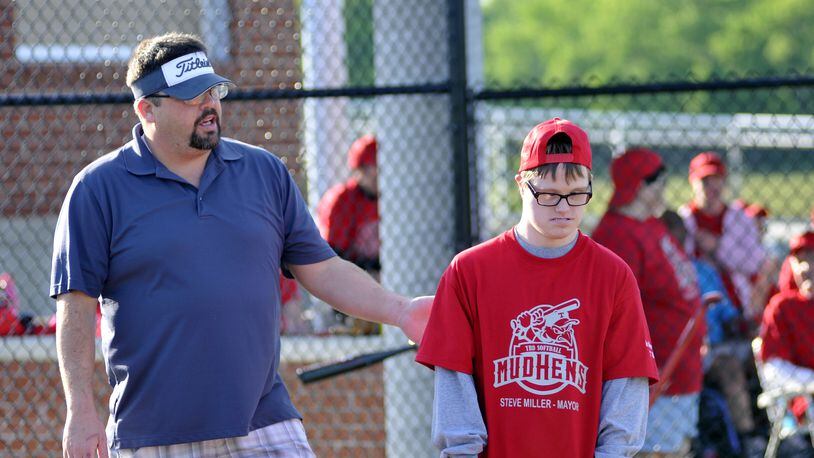 Game action on Friday, May 13, 2016, in the second week of the Joe Nuxhall Miracle League Field in Fairfield. MICHAEL D. PITMAN/STAFF