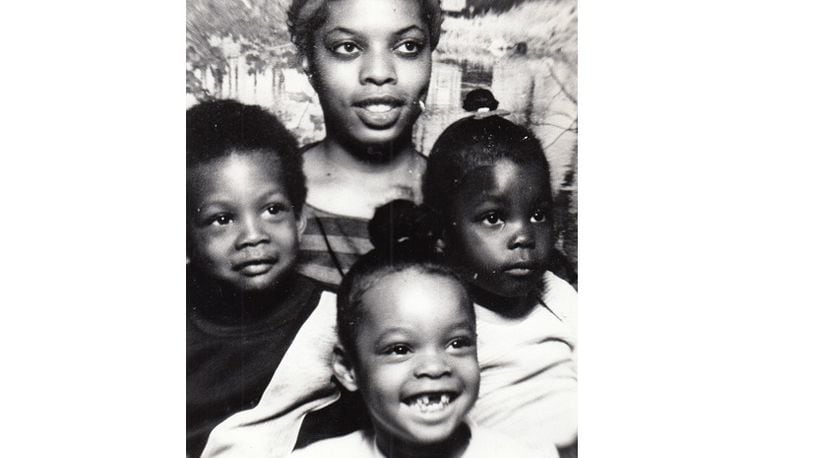 Lana Green with three of her children, Tia Green, 5; Voilana Green, 6, and Gregory Webster, 3. DAYTON DAILY NEWS ARCHIVE