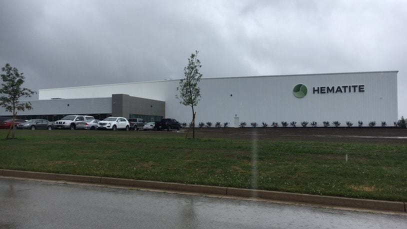 The exterior of Hematite’s Lau Parkway facility on a rainy day. Construction began in 2017. The Canadian-owned company uses recycled materials to treat vehicle under-bodies and craft acoustic components that affect how much noise penetrates a vehicle. THOMAS GNAU/STAFF