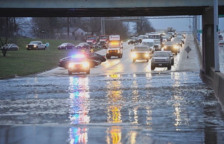 PHOTOS: First spring storms cause flooding, damage