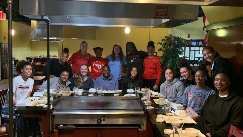 The Dayton women's basketball team poses for a photo at dinner at Osaka Japanese Steakhouse in Beavercreek on Thursday, Aug. 5, 2021. Contributed photo