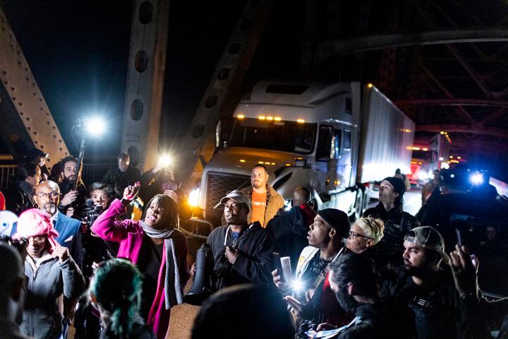 Protesters block traffic along the Arkansas-Memphis bridge in Memphis, Tenn. on Friday, Jan. 27, 2023, after the city of Memphis released video late Friday that shows several police officers beating Tyre Nichols, a 29-year-old Black man who later died. (B