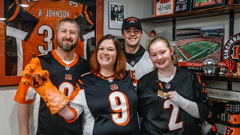The Wourms family from left, John, Elizabeth, Ben and Natalie are confident the Bengals will not only make it to the Super Bowl again but win it all this time. The Wourms are from Riverside. JIM NOELKER/STAFF