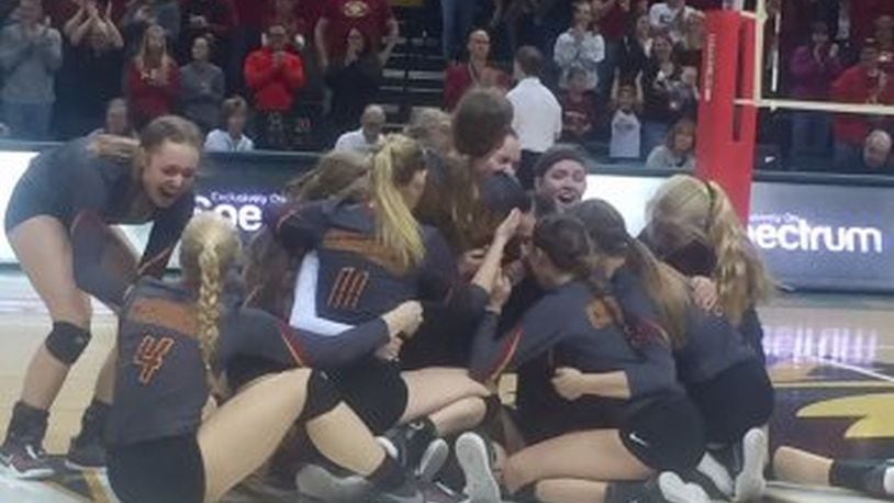 New Bremen players celebrate their state championship Saturday. DEBBIE JUNIEWICZ / CONTRIBUTED