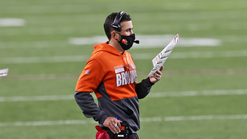 Cleveland Browns coach Kevin Stefanski looks at chart during the first half of the team's NFL football game against the Cincinnati Bengals, Thursday, Sept. 17, 2020, in Cleveland. (AP Photo/Ron Schwane)