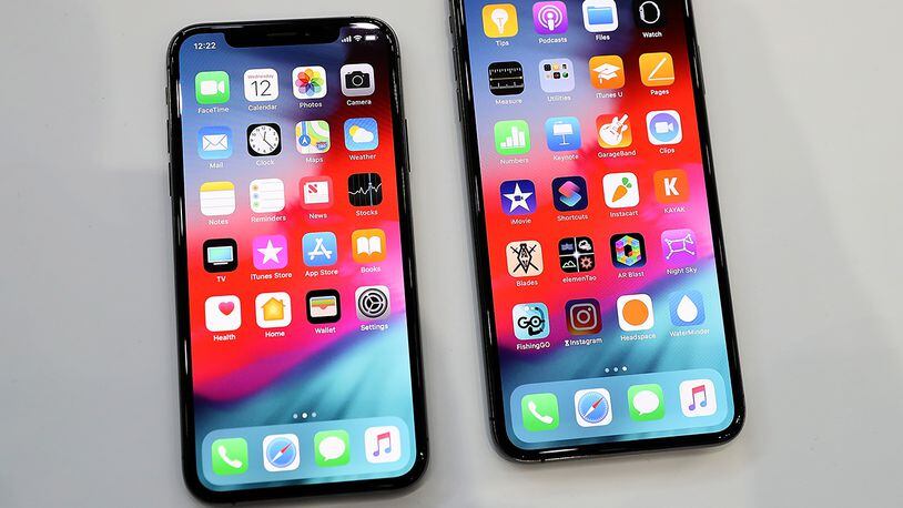 The Apple iPhone Xs (L) and iPhone Xs Max (R) are displayed during an Apple special event (Photo by Justin Sullivan/Getty Images)