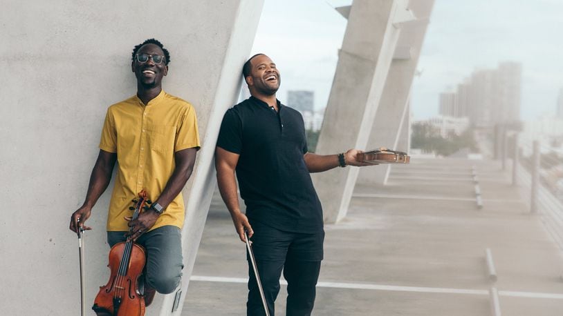 Kevin Kev Marcus Sylvester (right) and Wil B Baptiste of Black Violin, performing at the Schuster Center in Dayton on Tuesday, Nov. 5, is self-releasing their fourth album, Take the Stairs, on Friday, Nov. 1. CONTRIBUTED