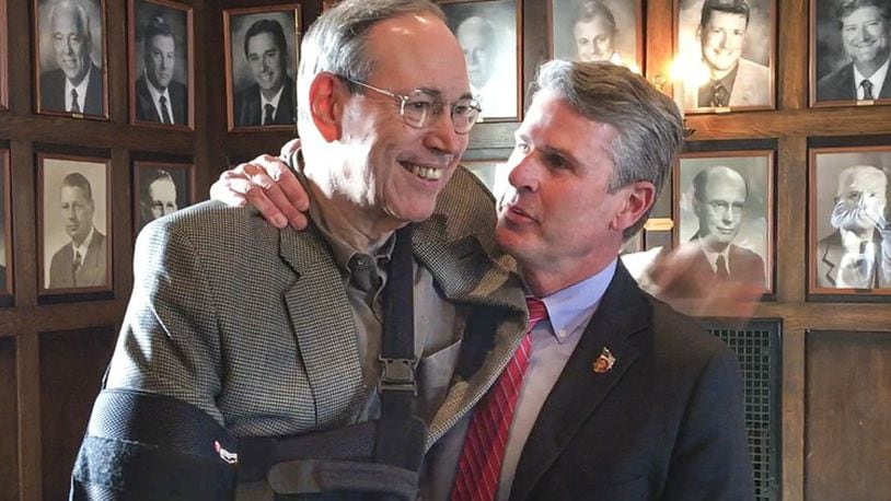 Bill DeFries, right, a Clayton businessman, thanks former Ohio Gov. Bob Taft for providing political mentorship over the past year. DeFries announced in January he was running for an open Montgomery County Commission seat. CHRIS STEWART / STAFF