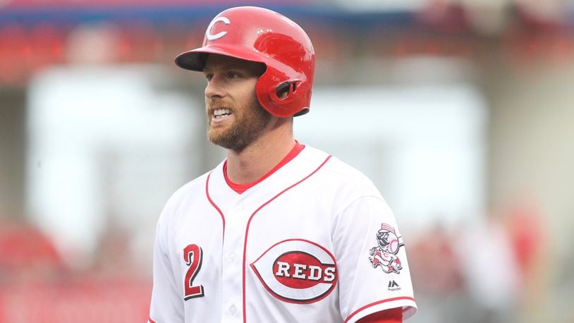 Reds shortstop Zack Cozart smiles during a game in May at Great American Ball Park. David Jablonski/Staff
