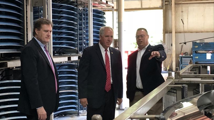 U.S. Reps Mike Turner (left) and John Shimkus (center) toured Staub Manufacturing Solutions in Harrison Twp. Monday. Company co-owner Steve Staub (right) showed the visiting congressmen his plant floor. CONTRIBUTED