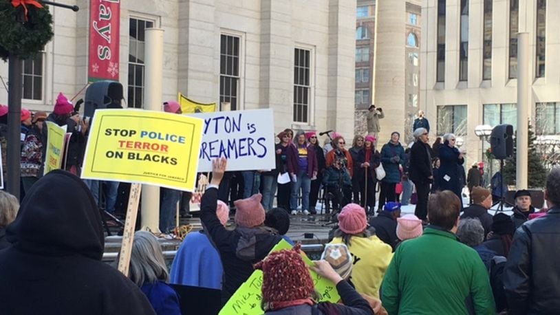 A few thousand people gathered Saturday at Courthouse Square in downtown Dayton for the Women’s March. NICK BLIZZARD/STAFF
