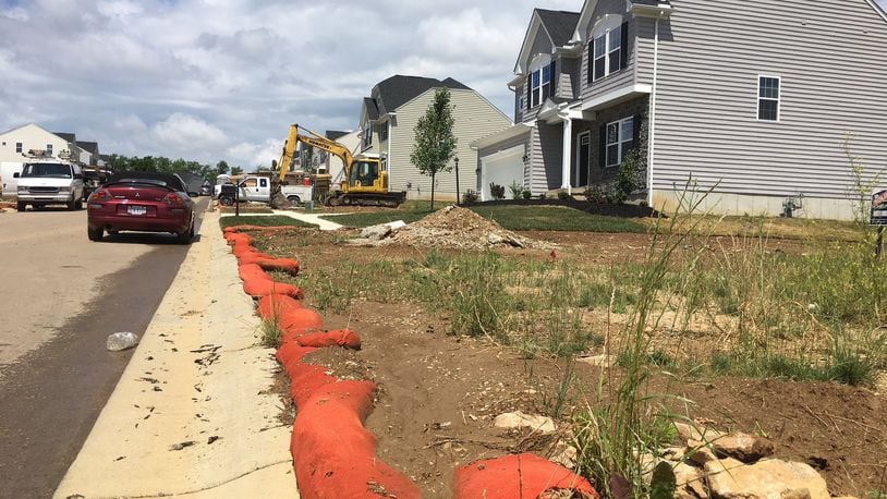 Homes are under construction at the new River Reserve development on Indian Ripple Road near Alpha Bellbrook Road in Beavercreek Twp. RICHARD WILSON/STAFF