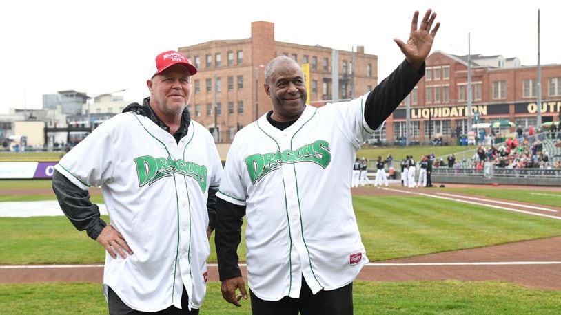Former Reds greats, Dragons coaches Tom Browning (left) and Ken Griffey on Saturday at Fifth Third Field for the team’s 20th anniversary celebration game. Nick Falzerano/CONTRIBUTED