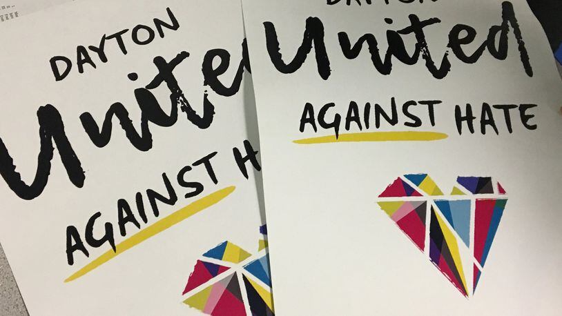 Dayton United Against Hate campaign posters will appear as full pages in future editions of the Dayton Daily news on Sunday and May 23. The campaign was created to counter a KKK group’s message but organizers hope the effort continues after a May 25 Klan rally. CHRIS STEWART / STAFF