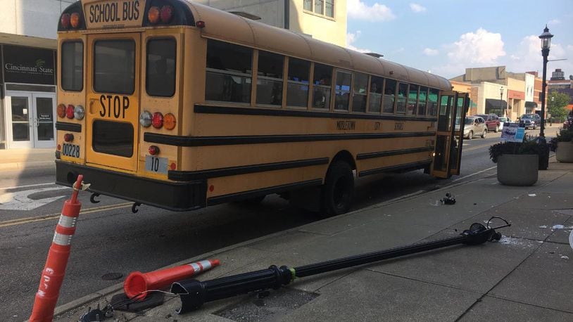 A Middletown City Schools bus allegedly hit light post at the corner of Central Avenue and South Main Street this afternoon. RICK McCRABB / STAFF