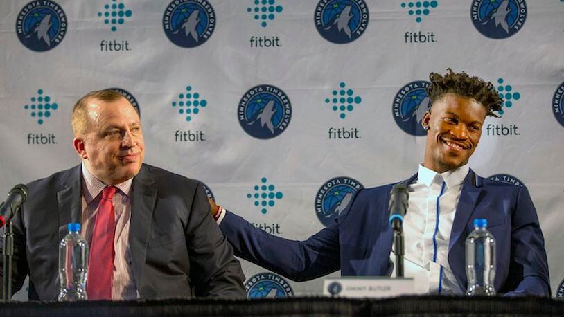 Minnesota Timberwolves new point guard Jimmy Butler, right, pats Timberwolves head coach Tom Thibodeau on the back during a press conference at Mall of America in Bloomington, Minn. on Thursday, June 29, 2017.(AP Photo/Andy Clayton-King)