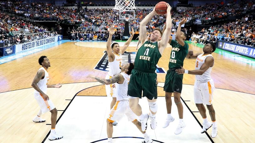 DALLAS, TX - MARCH 15: Loudon Love #11 of the Wright State Raiders with the ball against the Tennessee Volunteers in the first round of the 2018 NCAA Men’s Basketball Tournament at American Airlines Center on March 15, 2018 in Dallas, Texas. (Photo by Ronald Martinez/Getty Images)