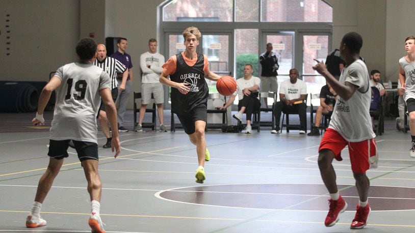 Dayton recruit Lukas Frazier dribbles during the Ohio High School Basketball Coaches Association Showcase on Saturday, June 29, 2019, at Capital University in Bexley. David Jablonski/Staff