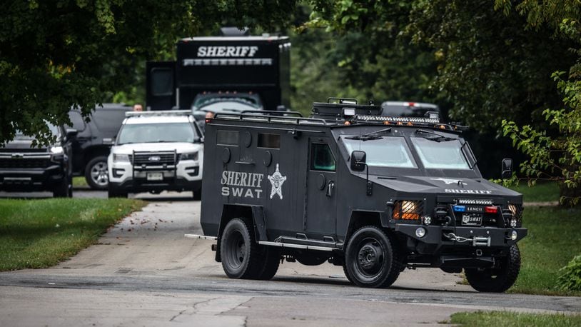 The Montgomery County Regional SWAT Team responded Sept. 20, 2021, to a home in the 100 block of North Northhampton Avenue in Trotwood for a standoff that followed a domestic disturbance call. JIM NOELKER/STAFF