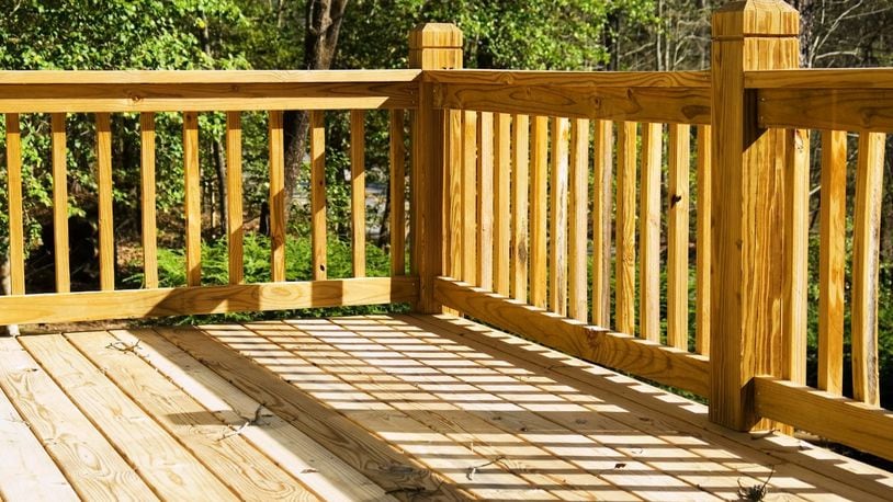 Bleaching a splintered deck will remove mold and prepare the surface for further treatment. (Dreamstime)