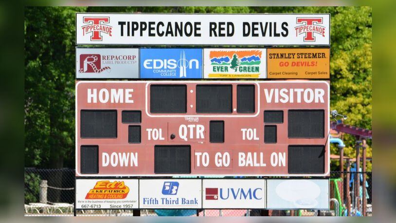 A proposed ordinance would allow Tipp City schools to replace this scoreboard with a larger version with updated features. CONTRIBUTED