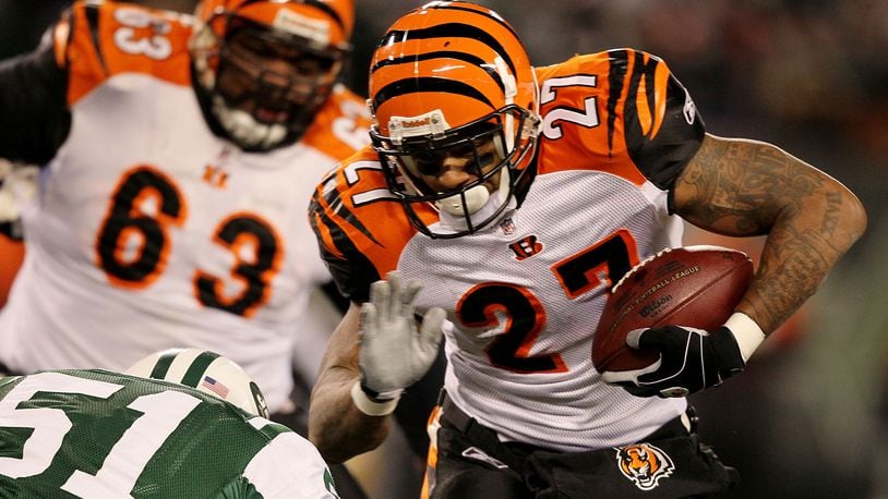 EAST RUTHERFORD, NJ - JANUARY 03: Larry Johnson #27 of the Cincinnati Bengals runs the ball against Ryan Fowler #51 of the New York Jets at Giants Stadium on January 3, 2010 in East Rutherford, New Jersey. (Photo by Al Bello/Getty Images)