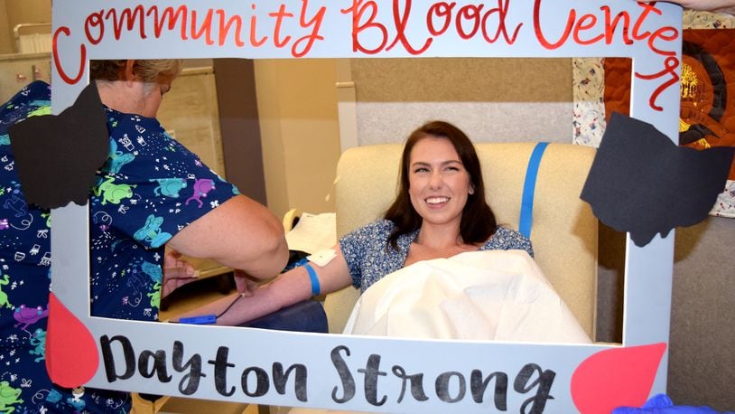 Katlin Becraft donates blood during a recent 'Dayton Strong' blood drive at Dayton Community Blood Center. CONTRIBUTED PHOTO