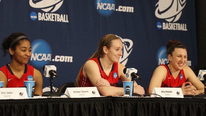 Dayton's Amber Deane, Ally Malott and Andrea Hoover smile during a postgame press conference after a victory against Louisville in the third round of the NCAA tournament on Saturday, March 28, 2015, at the Times Union Center in Albany, N.Y. David Jablonski/Staff