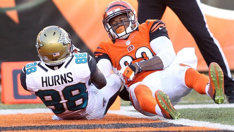 CINCINNATI, OH - NOVEMBER 2: Allen Hurns #88 of the Jacksonville Jaguars catches a pass for a touchdown in front of Terence Newman #23 of the Cincinnati Bengals during the fourth quarter at Paul Brown Stadium on November 2, 2014 in Cincinnati, Ohio. Cincinnati defeated Jacksonville 33-23. (Photo by John Grieshop/Getty Images)