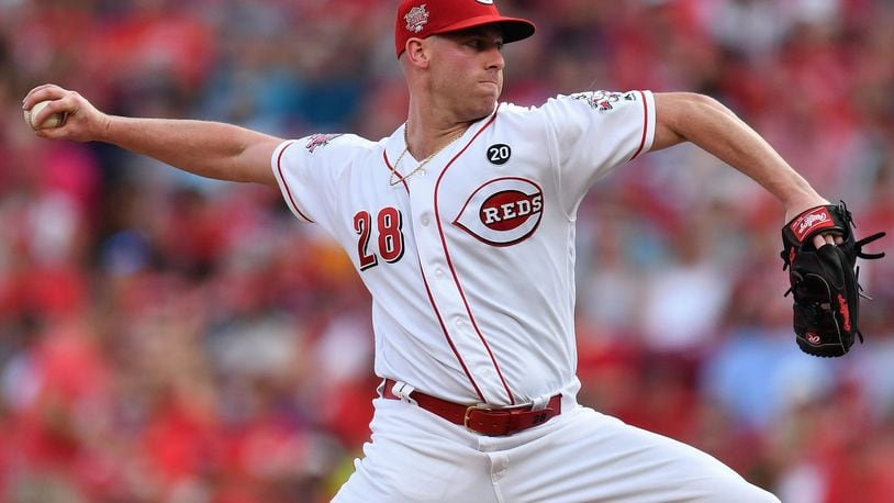 CINCINNATI, OH - JULY 27:  Anthony DeSclafani #28 of the Cincinnati Reds pitches in the second inning against the Colorado Rockies at Great American Ball Park on July 27, 2019 in Cincinnati, Ohio.  (Photo by Jamie Sabau/Getty Images)