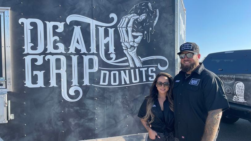 After traveling all over the United States and stopping at various donut shops, donut connoisseur Cameron Hill and his girlfriend, Lainey Lucas, have opened Death Grip Donuts. NATALIE JONES/STAFF