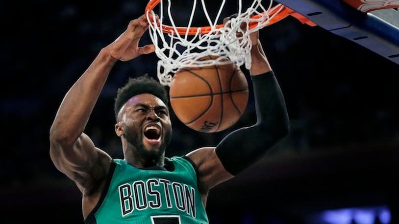 Boston Celtics' Jaylen Brown dunks during the second half of the NBA basketball game against the New York Knicks, Sunday, April 2, 2017, in New York. (AP Photo/Seth Wenig)