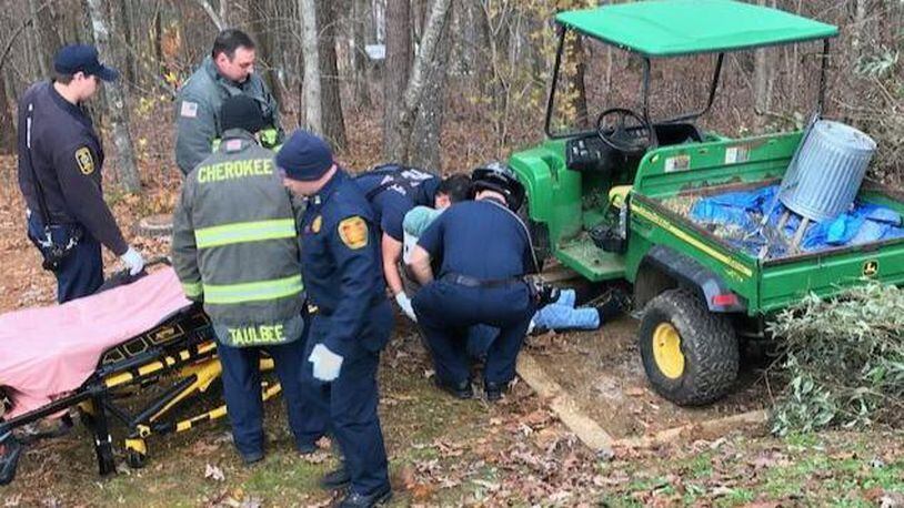 Emergency crews in Cherokee County, Georgia, free a 90-year-old man from under an off-road vehicle.
