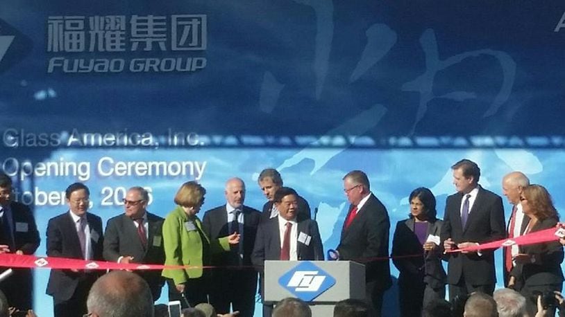 Fuyao Glass America, government and state officials cut a ribbon in celebration of the company’s grand opening in October 2016.