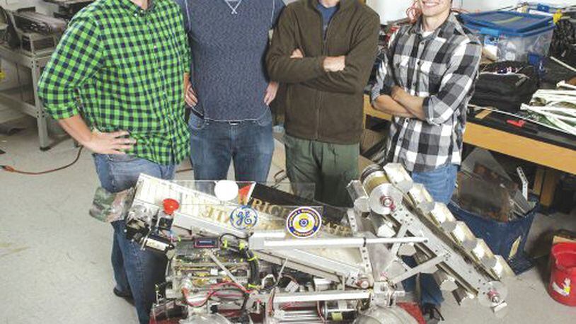 From left, Wright State Robotics Club members Mike Wagner, Tyler Doerman, Brian Shivers and Ryan Hendrickson (along with Logan Rickert, not pictured) will participate in the NASA Robotic Mining Competition at the Kennedy Space Center. SUBMITTED