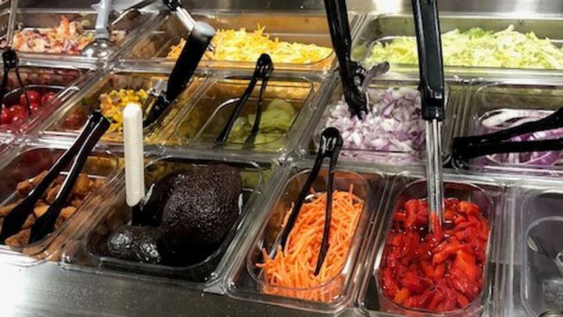 The condiment bar at Flyby BBQ at the Mall at Fairfield Commons in Beavercreek, which announced today it would temporarily close its dining room and focus on delivery and pickup to limit its employees' potential exposure to the Coronavirus.