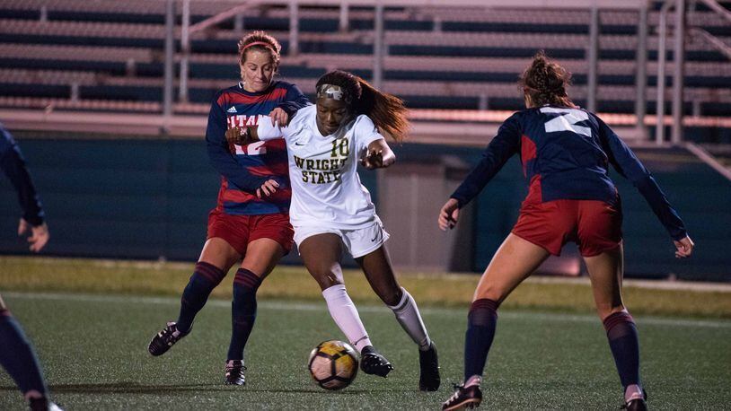 Wright State’s Aaliyah Patten battles two Detroit Mercy defenders during a game this season. Patten, a Fairborn High School graduate, was named Horizon League Player of the Year. Joseph Craven/CONTRIBUTED
