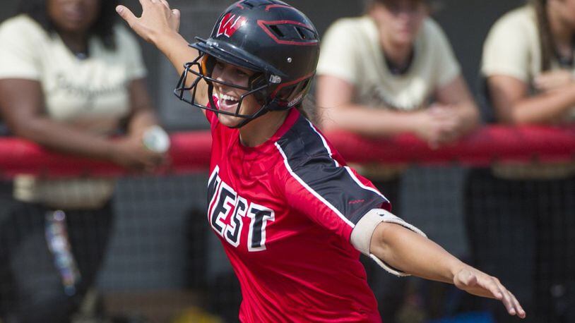 Lakota West’s Allie Cummins rounds third base after her eighth-inning home run in a Division I state semifinal against Perrysburg at Firestone Park in Akron on May 31. PHIL LONG/OHIO PRESS PHOTO SYSTEM