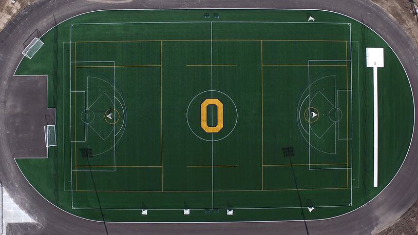 The regulation field is lined for four sports at Oakwood's Lane Stadium.   For the first time in school history, Oakwood High School will now have a dedicated sports facility to accommodate soccer, field hockey, boys and girls lacrosse and track. (Ty Greenlees/Staff)