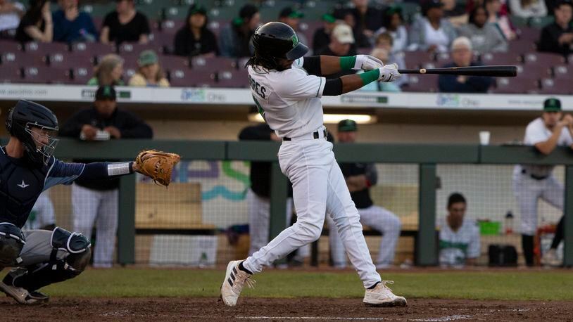 Dragons infielder Jose Torres connects for his third home run in two nights, giving the Dragons a 1-0 lead in the third inning Thursday night at DayAir Ballpark. Jeff Gilbert/CONTRIBUTED