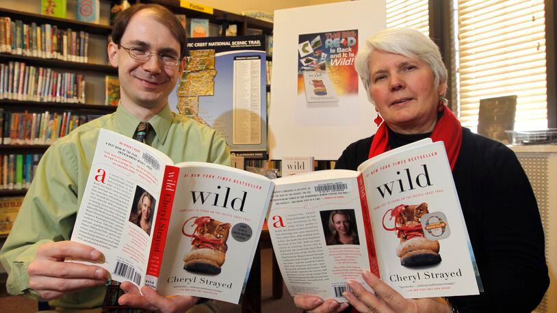 Archived photo: Ben Murphy, then Dayton Metro Library adult materials selections specialist and Jean Gaffney, then manager of aquistion and collection department, were the co-chairs of the 2014 Big Read committee. The 2014 book  was "Wild: Lost to Found on the Pacific Crest Trail," by Cheryl Strayed. LISA POWELL / STAFF