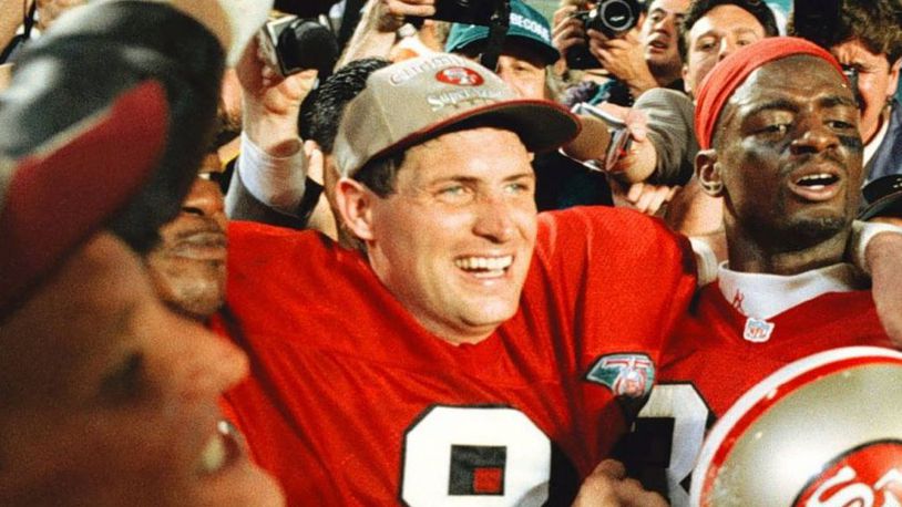 Steve Young (8) and the San Francisco 49ers were on top of the football world after defeating the San Diego Chargers in Super Bowl XXIX.