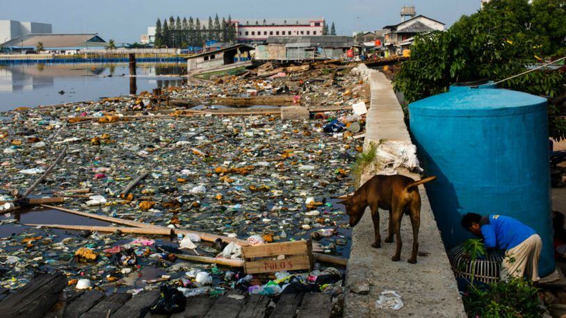 Plastic trash along a seawall in Jakarta in May 2018. (Photo by Ed Wray/Getty Images)