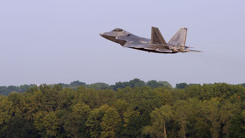 A U.S. Air Force F-22 Raptor with the 325th Fighter Wing, takes off from Wright-Patterson Air Force Base last August, heading back home to Eglin AFB, Fla. The 325th FW evacuated some of its aircraft to Wright-Patterson to avoid tropical storms threatening their home base. U.S. AIR FORCE PHOTO/AIRMAN 1ST CLASS ALEXANDRIA FULTON