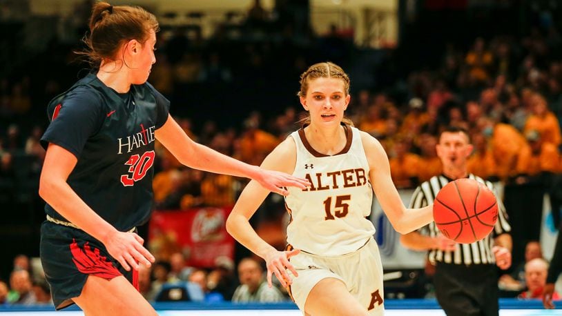 Alter High School sophomore Riley Smith drives past Bishop Hartley junior Ella Brandewie during a state semifinal game at UD Arena. CONTRIBUTED PHOTO BY MICHAEL COOPER