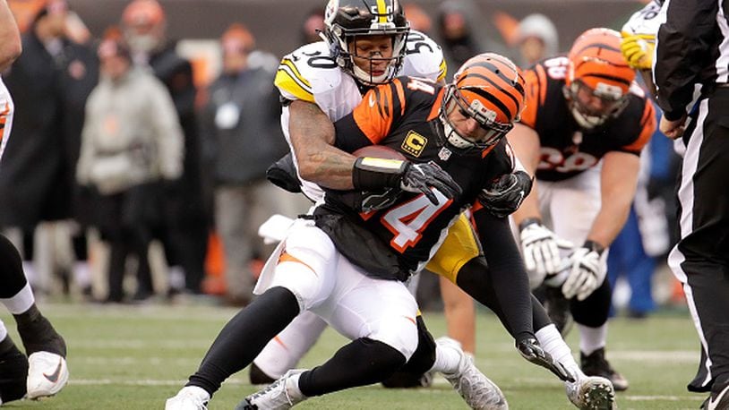 CINCINNATI, OH - DECEMBER 18: Ryan Shazier #50 of the Pittsburgh Steelers sacks Andy Dalton #14 of the Cincinnati Bengals during the third quarter at Paul Brown Stadium on December 18, 2016 in Cincinnati, Ohio. (Photo by Andy Lyons/Getty Images)