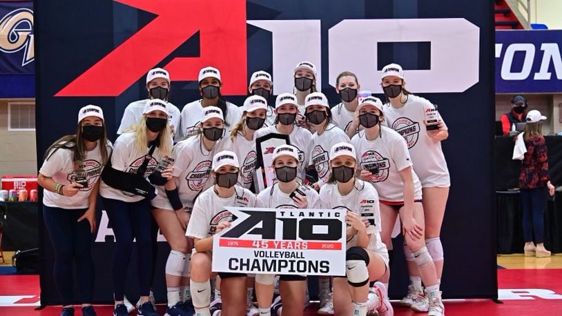 The Dayton Flyers celebrate after winning the Atlantic 10 Conference volleyball tournament championship on Saturday, April 3, 2021, at the Frericks Center. Photo by Erik Schelkun