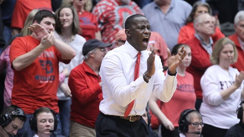 Dayton’s Anthony Grant claps during a game against Saint Louis on Tuesday, Feb. 20, 2018, at UD Arena. David Jablonski/Staff