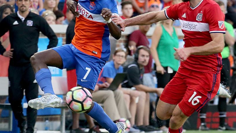 Contributed photo/WCPO FC Cincinnati forward Kadeem Dacres controls the ball while Chicago Fireâ€™s Jonathan Campbell pressures during their U.S. Open Cup match at Nippert Stadium in Cincinnati Wednesday, June 28, 2017.