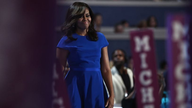 PHILADELPHIA, PA - JULY 25: First lady Michelle Obama walks on stage before delivering remarks on the first day of the Democratic National Convention at the Wells Fargo Center, July 25, 2016 in Philadelphia, Pennsylvania. An estimated 50,000 people are expected in Philadelphia, including hundreds of protesters and members of the media. The four-day Democratic National Convention kicked off July 25. (Photo by Jessica Kourkounis/Getty Images)